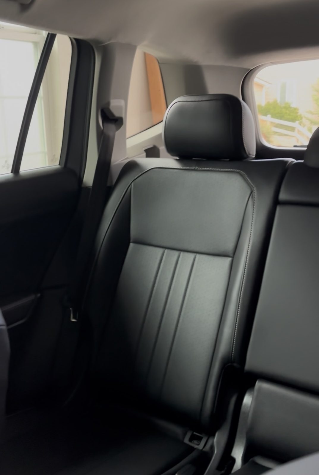 Clean black leather rear seats in an SUV